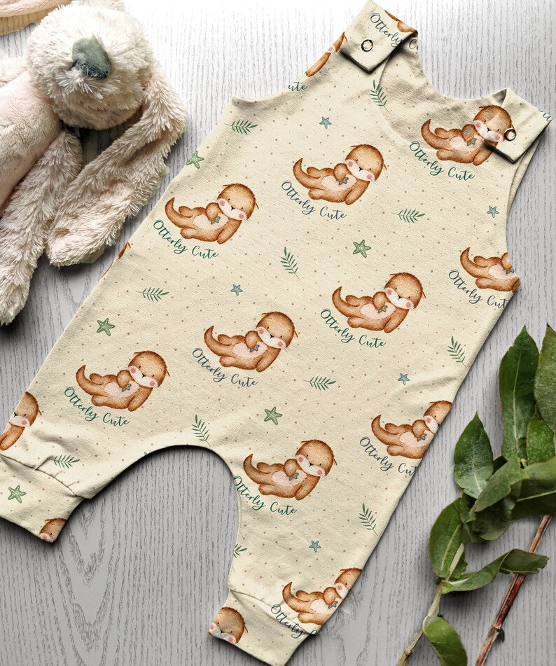 Animals otter sand